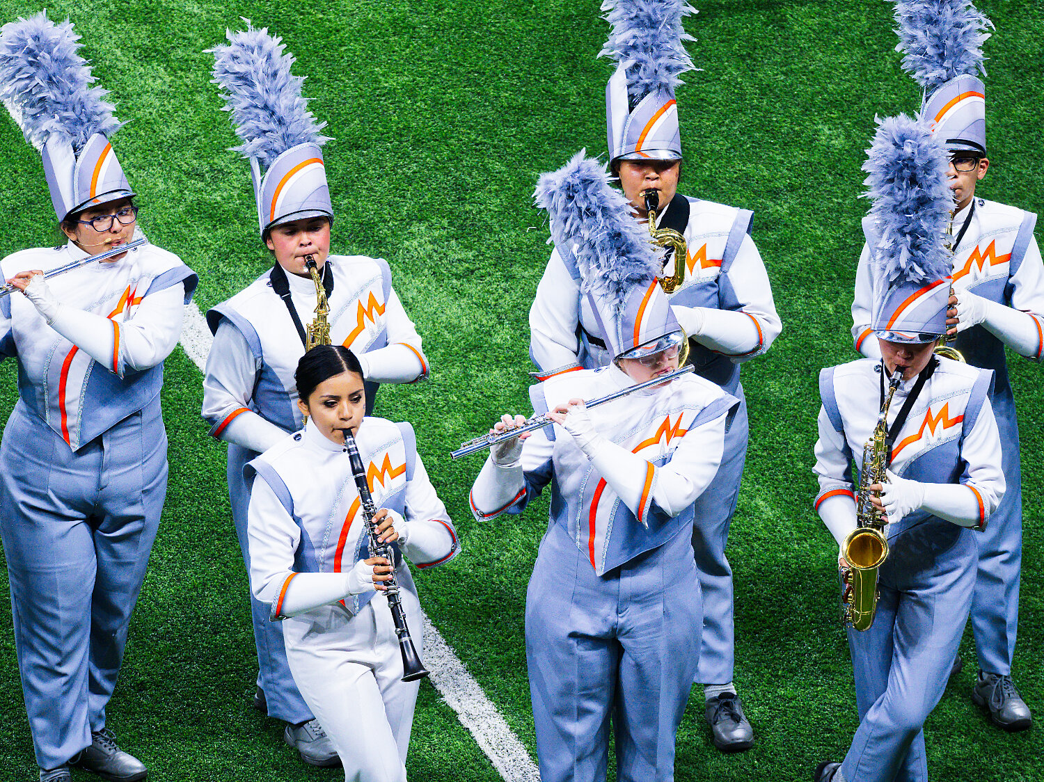 Woodwinds players are featured, including flautist Melissa Torres (far left), who also soloed, and drum major Mariana Delgadillo (hatless, front left) on clarinet. [see several more swarm shots]